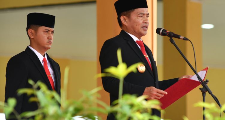 Pj Gubsu Hassanudin saat menjadi inspektur Upacara Peringatan Hari Agraria dan Tata Ruang Nasional (HANTARU) ke-63 yang diselenggarakan oleh Kanwil Badan Pertanahan Nasional Provinsi Sumut, di Lapangan Astaka Jalan Willem Iskandar Kabupaten Deliserdang. (Dok)