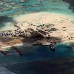 Sebuah gambar satelit menunjukkan pembangunan yang dilakukan China di sebuah pulau di Cuarteron Reef, Laut China Selatan, tahun 2014 lalu. (Dok)